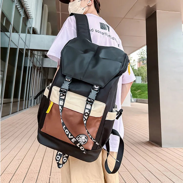 Oxford cloth backpack in black, green, or red with 32cm width and three carrying options