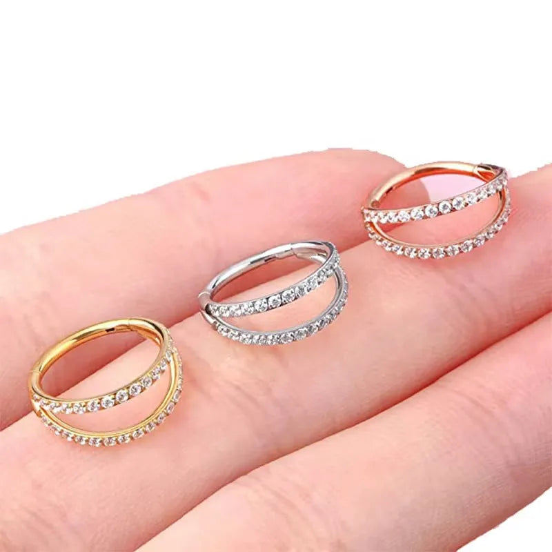 G23 titanium alloy nose ring with diamond treatment in steel or gold colour, showing 1.0mm and 1.2mm diameter options