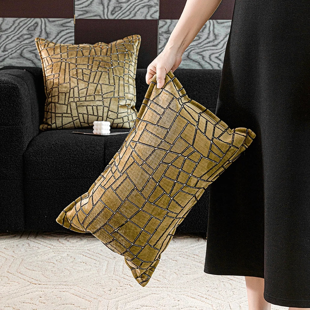Tuhao gold geometric abstract pillow in 50x50cm size with feather velvet texture on a sofa