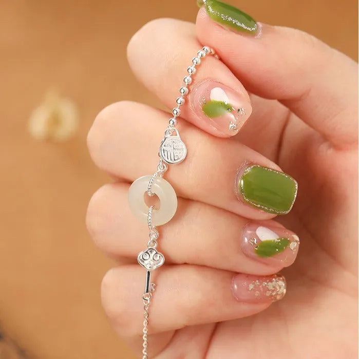Women's 925 silver bracelet with Hetian jade elements in Chinese style geometry design