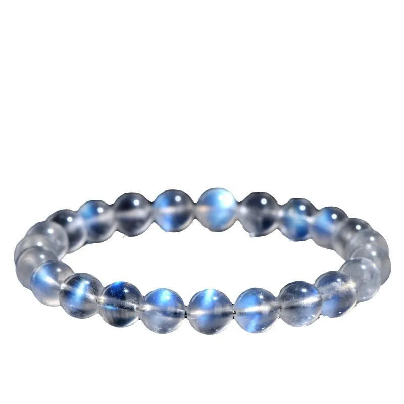 Natural cream body blue moonlight crystal bracelet with grinding treatment and unisex design