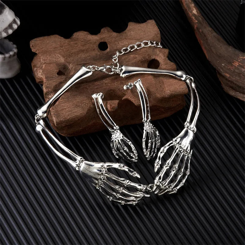 Dark style skull and ghost hand jewellery set with matching necklace and earrings in electroplated alloy