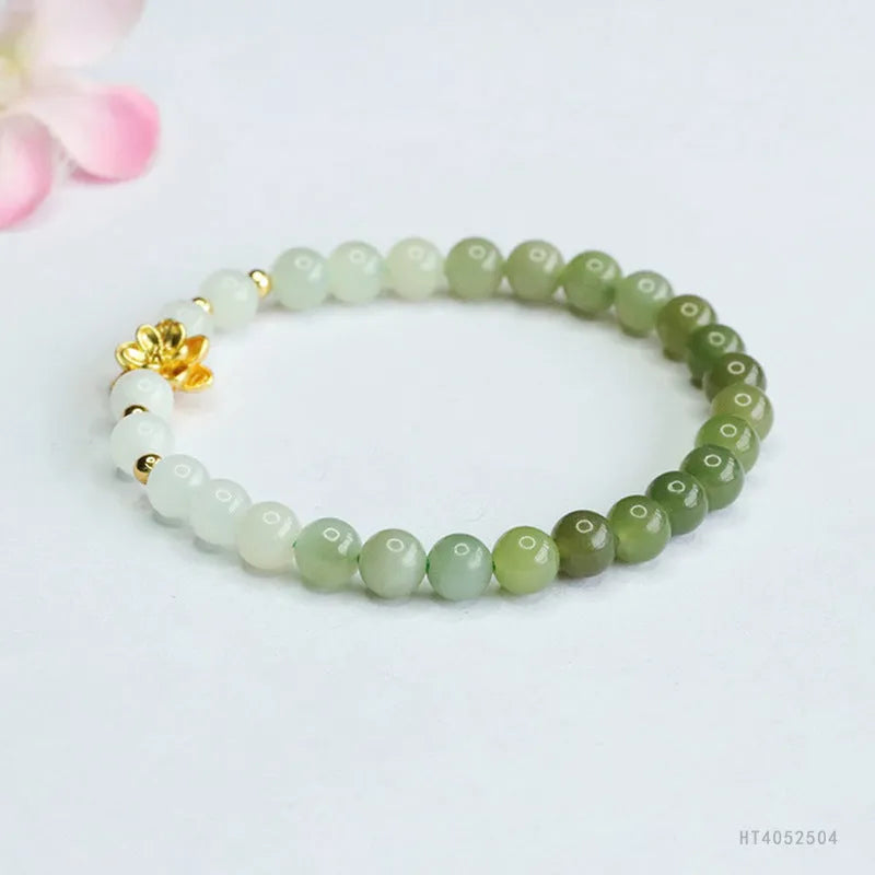 Hand-woven ancient style bracelet with Hetian jade gradient colours and lotus flower pattern