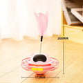 Pink rotating cat toy turntable measuring 17cm by 10cm for feline play and exercise
