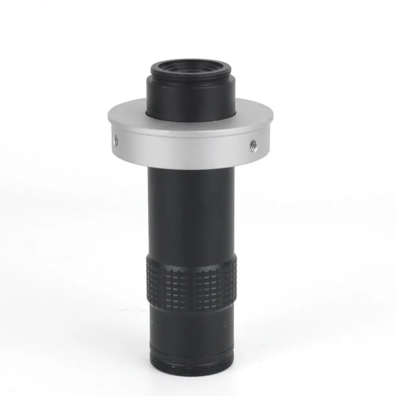 Black metal industrial camera monocular lens for 130x magnification with 60-300mm working distance.