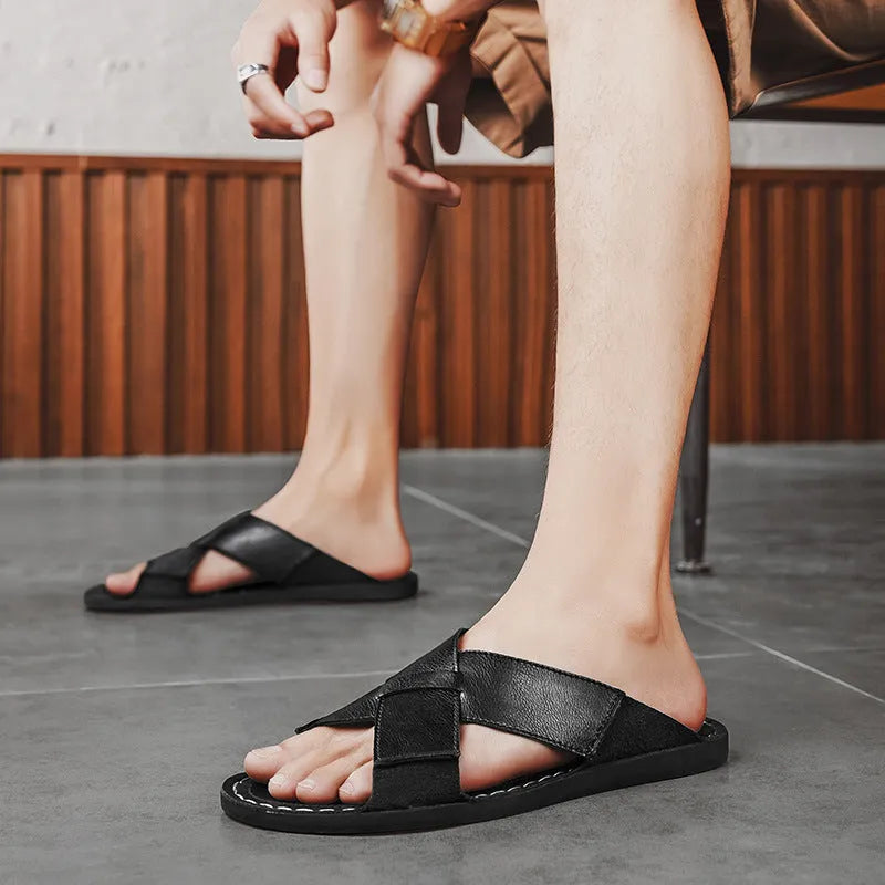 Men's black frosted genuine pigskin leather slip-on sandals with a sewn rubber sole.