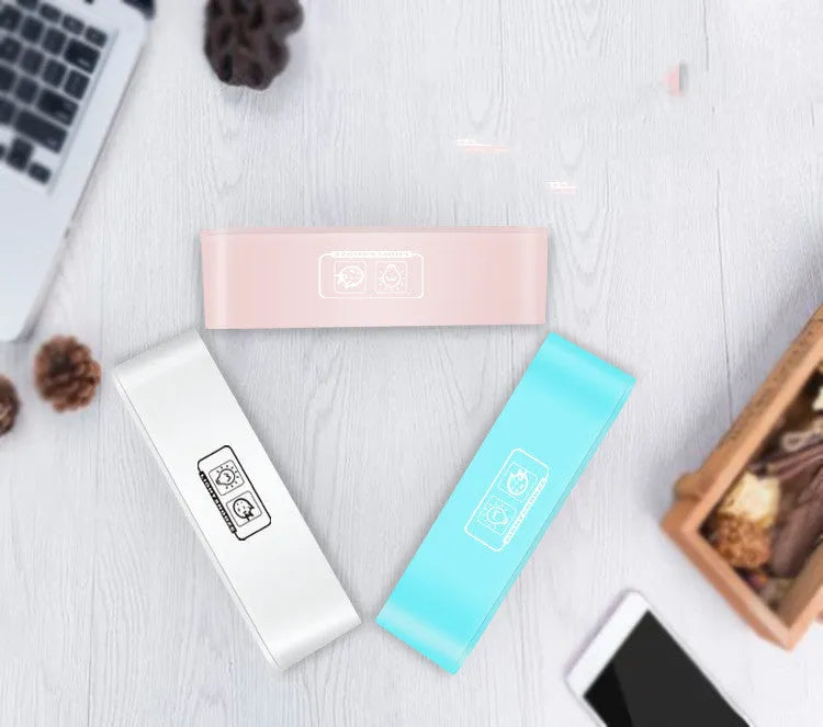 Rectangular LED atmosphere alarm clock in blue or pink with digital display and music function