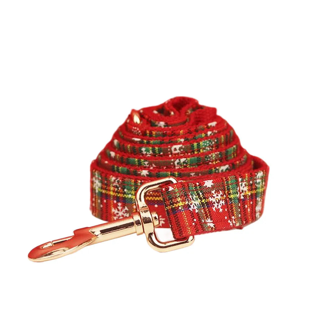 Red Christmas dog collar and leash set with snowflake patterns, plaid leash, vest, and bow tie