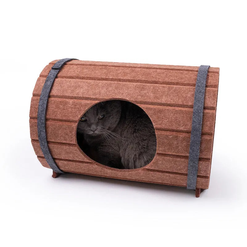 Assembled wine barrel shaped pet bed made from polyester fibre felt pieces for cats