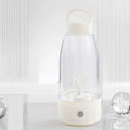 Automatic electric shaker bottle in green, pink, or white with USB port and handle for blending smoothies