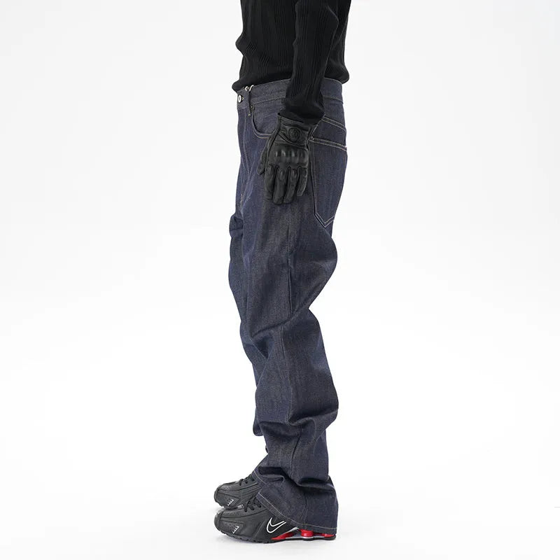 A pair of dark blue loose straight-leg men's jeans on a plain background.