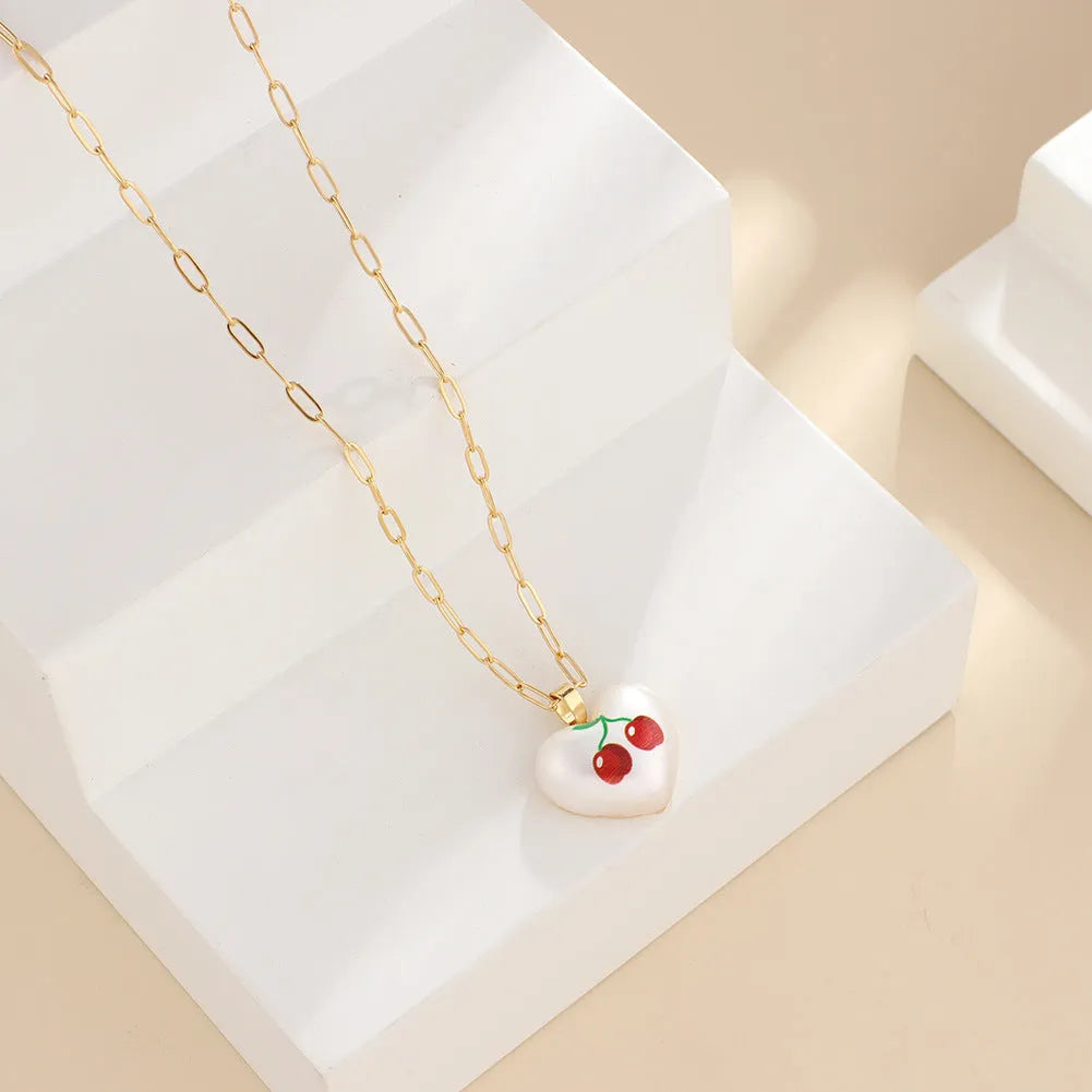 Fresh style geometric necklace with choice of apple, pineapple, strawberry, cherry, and pear fruit pendants on an adjustable chain.