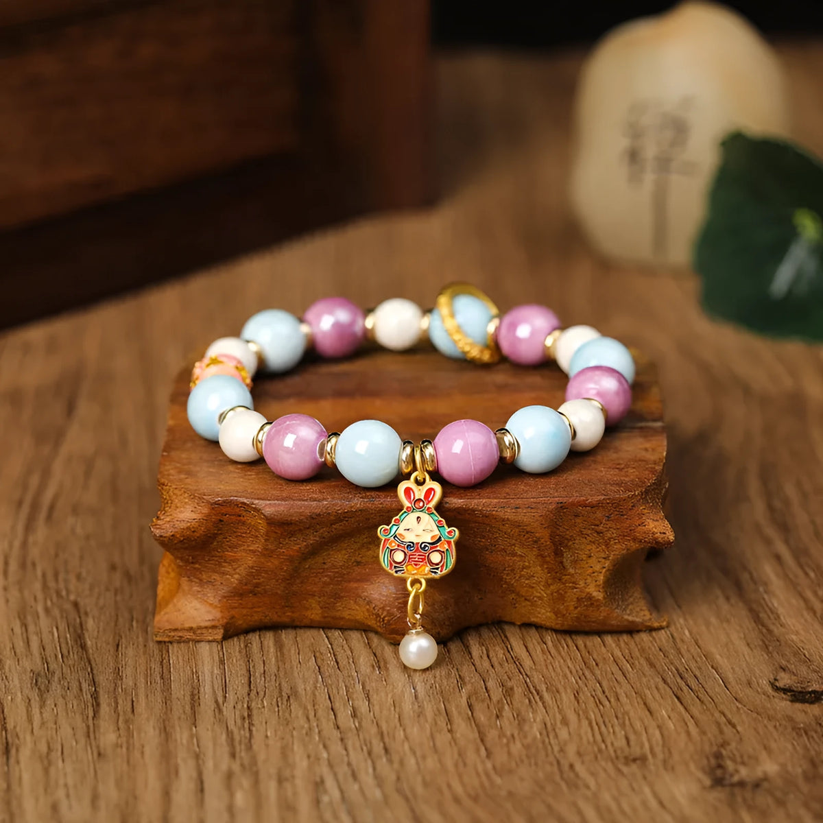 Handmade fragrant grey ceramic adjustable bracelet with lucky rabbit charm.