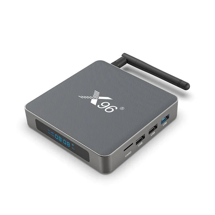 Smart voice set-top box with remote control, HDMI cable, and power adapter on a table
