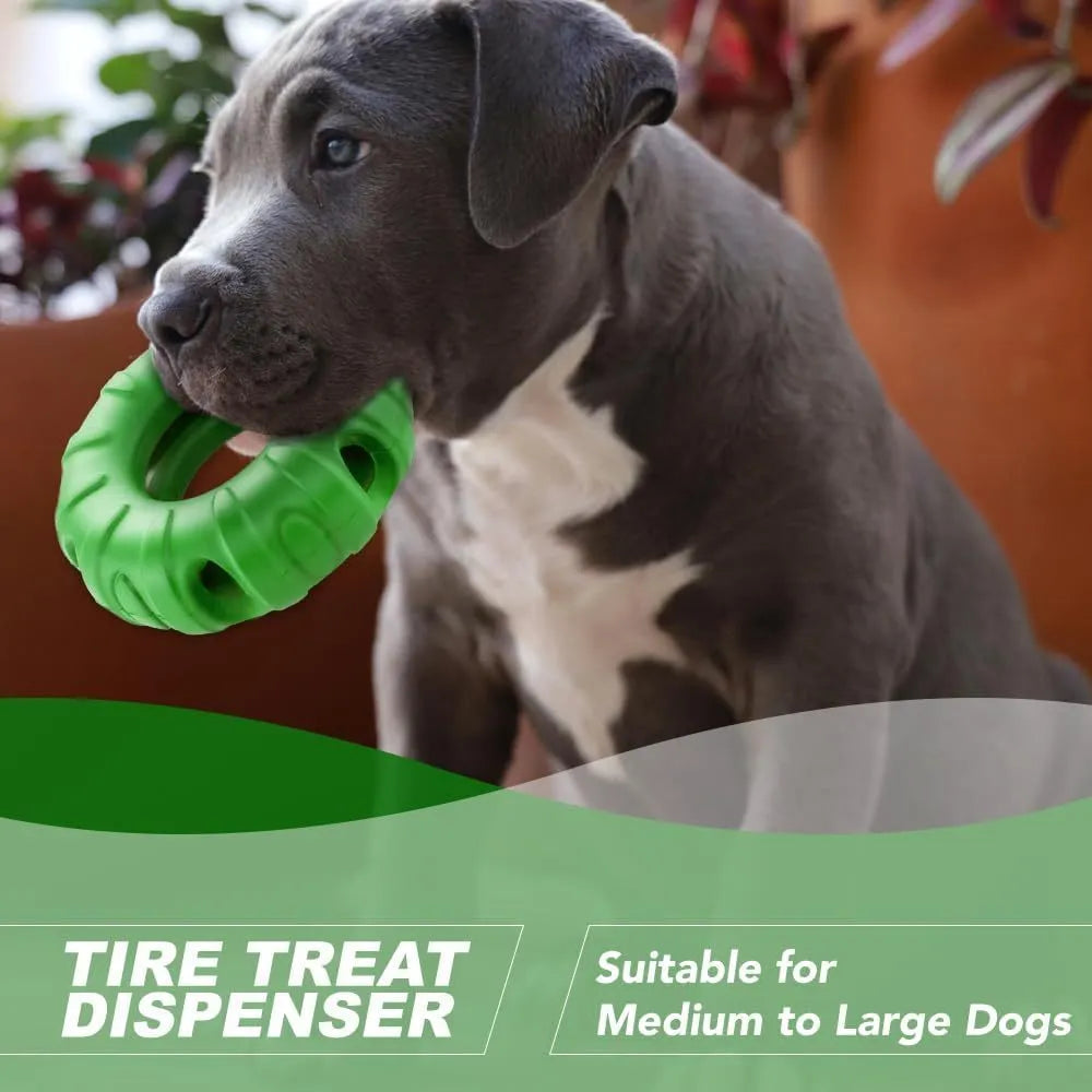 Blue rubber dog chew toy shaped like a tyre with oval openings for food dispensing, measuring 11cm by 4cm