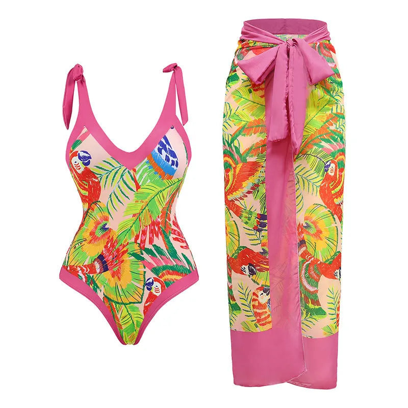 Pink floral print one-piece swimsuit with V-neck and attached skirt for women