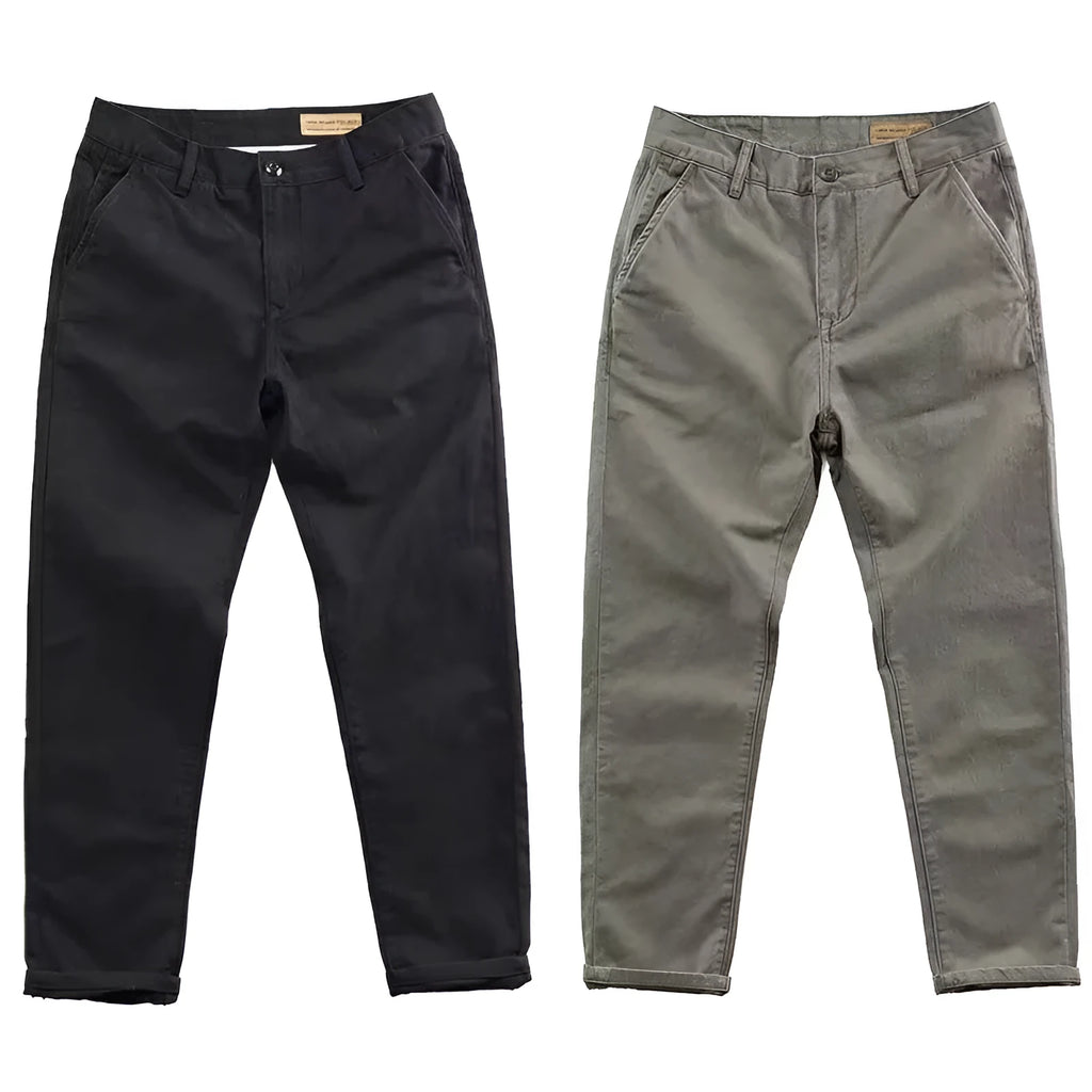 Men's slim-fit casual trousers in a micro elastic fabric, shown in a straight-leg cut and solid colour.