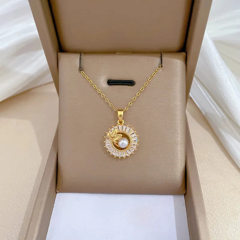 Women's geometric jewellery set with square full diamond motif, leaf design, titanium steel chain, and gold-plated copper pendant and earrings.