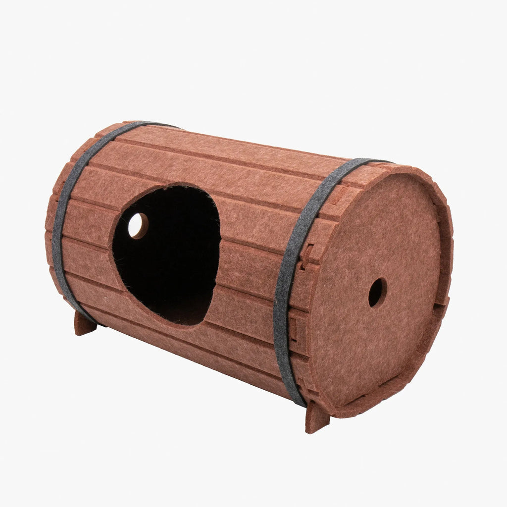 Assembled wine barrel shaped pet bed made from polyester fibre felt pieces for cats