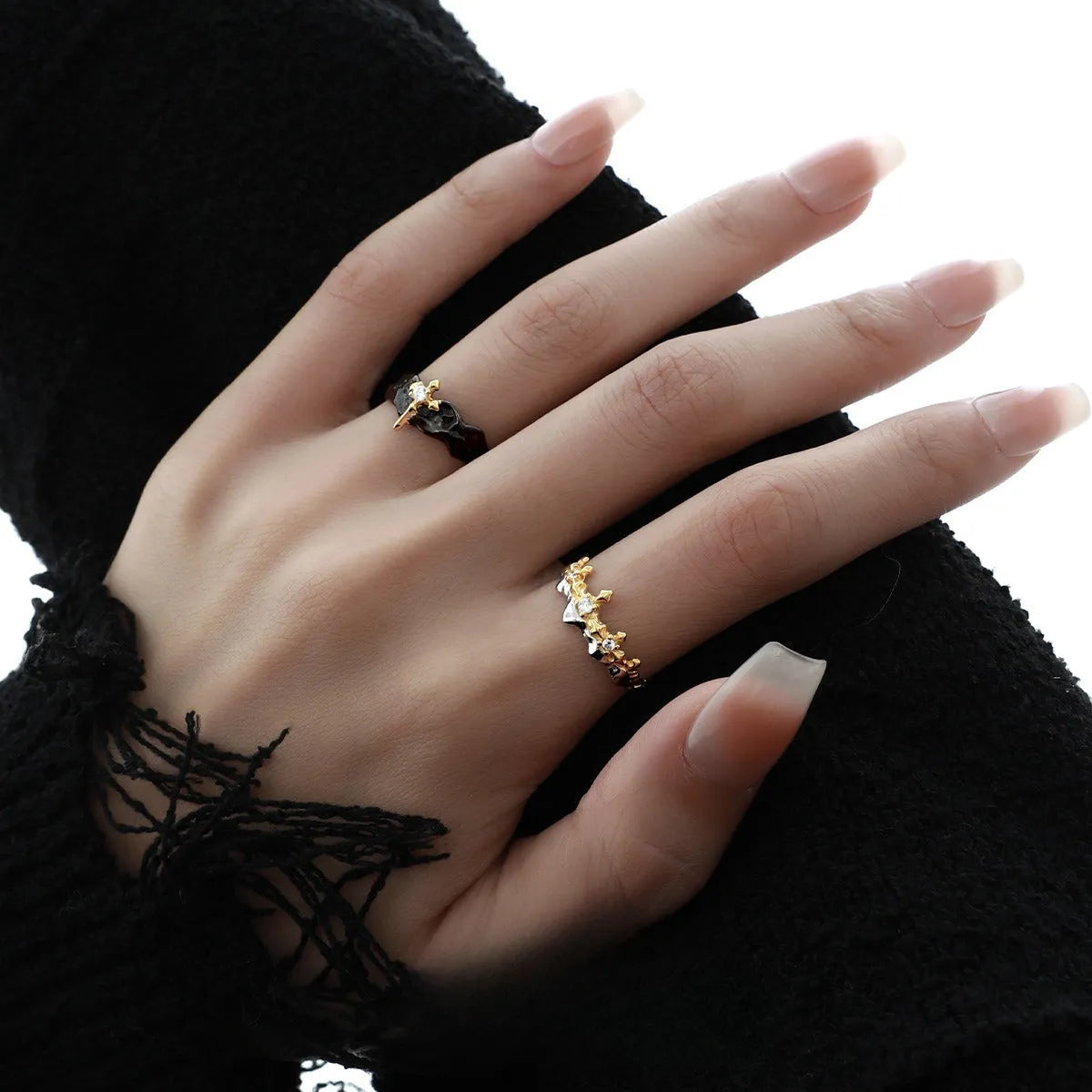 Adjustable opening silver couple ring with electroplated white gold or black gold finish, showing original design