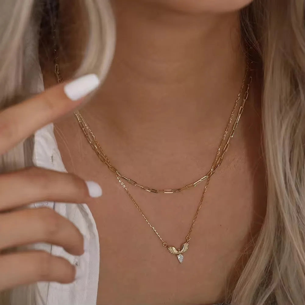 Adjustable sterling silver eagle necklace with O-ring chain in white gold or yellow gold finish