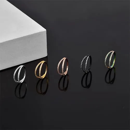 G23 titanium alloy nose ring with diamond treatment in steel or gold colour, showing 1.0mm and 1.2mm diameter options