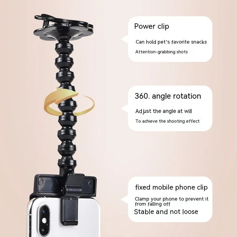 Black pet photography tool with rotating clip and snack holder for mobile phone cameras