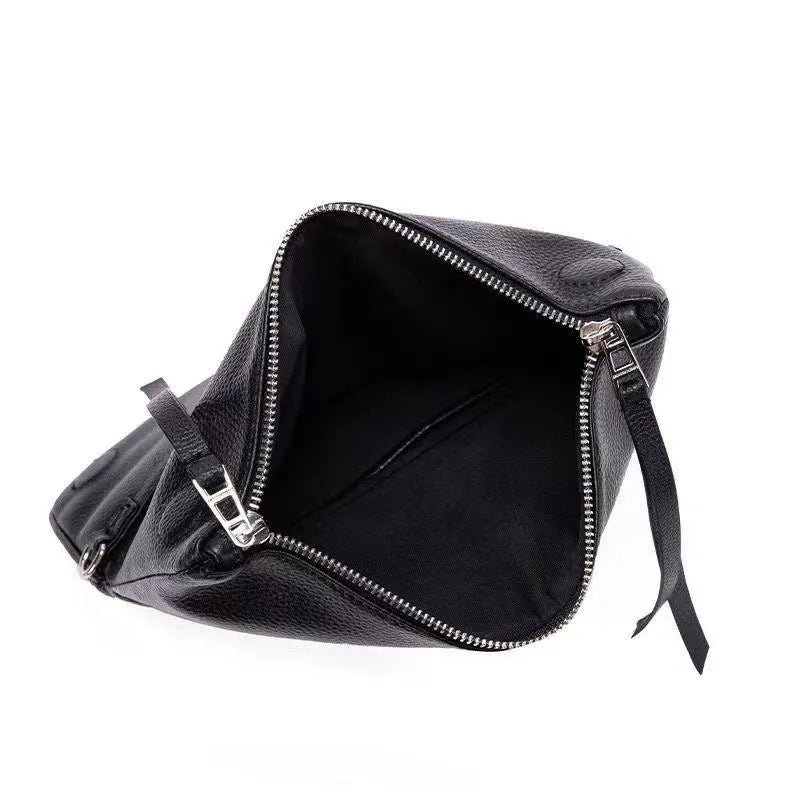 Women's black shoulder messenger bag with chain detailing and organised interior compartments