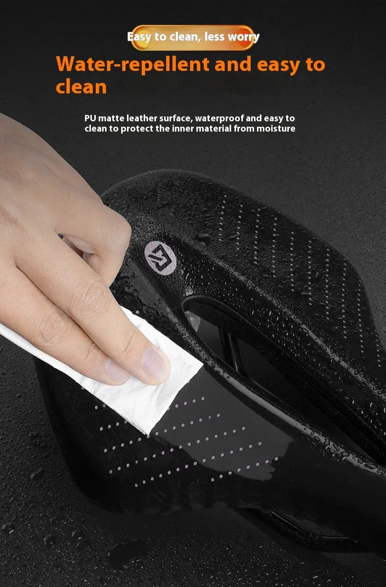 Black and pink bicycle seat cushion for mountain bikes with PU foam construction