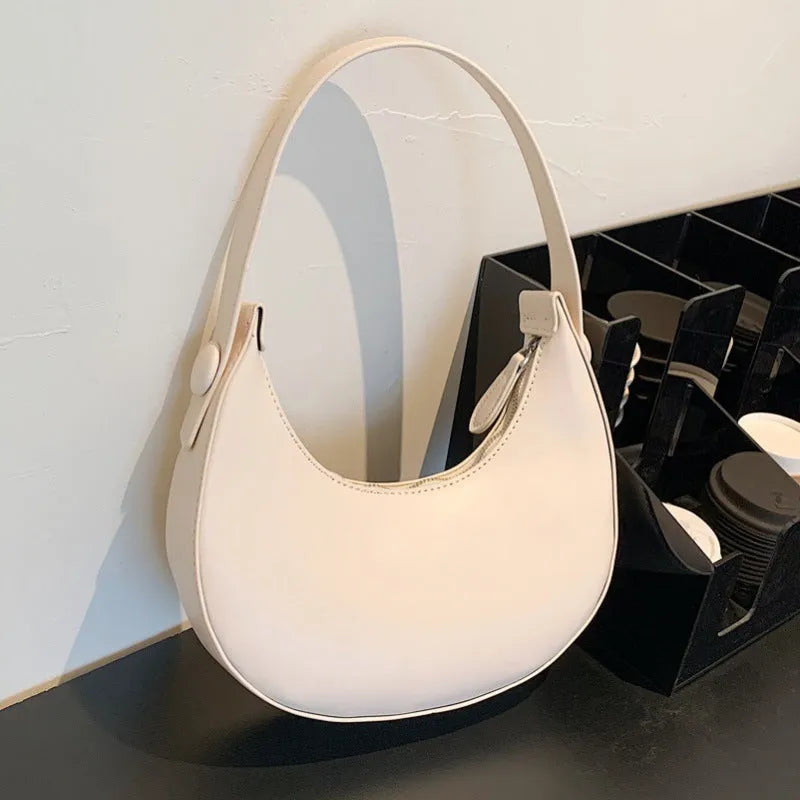 Women's retro shoulder bag in PU with dumpling shape, measuring 21x20x6cm, in black colour with zipper organiser