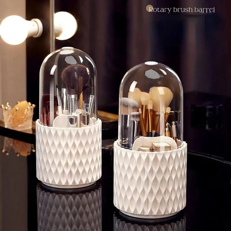 White rotating acrylic makeup brush storage box with transparent lid on desktop