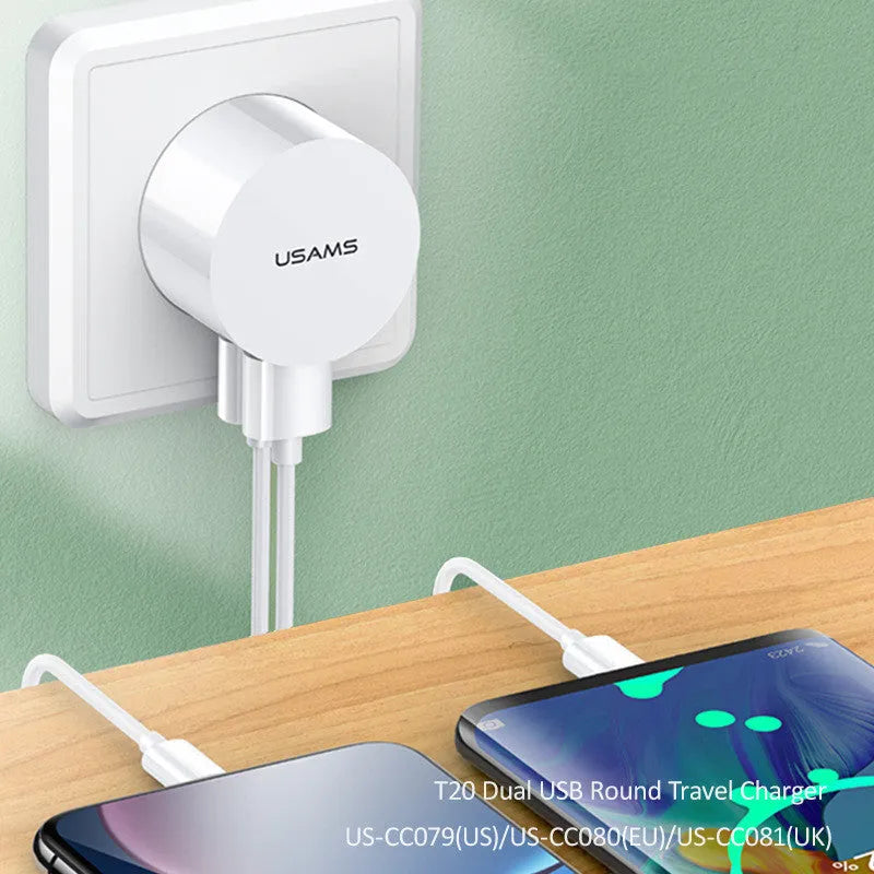 White portable USB phone charger with universal international adapter for UK US and EU power sockets