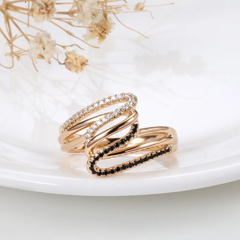 Women's copper ring with micro-inlaid zircon detailing in WK2230 colour on a hand