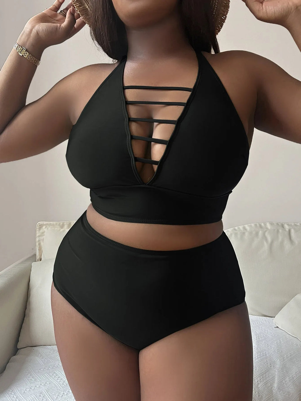 Plus size adjustable halter bikini with high-waist briefs in black, showing backless design and cross shoulder straps