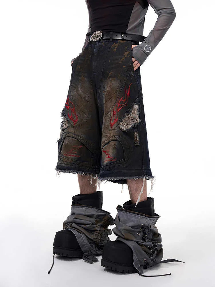 Men's retro wide-leg jeans with detachable trouser legs showing convertible feature and mid-high waist design