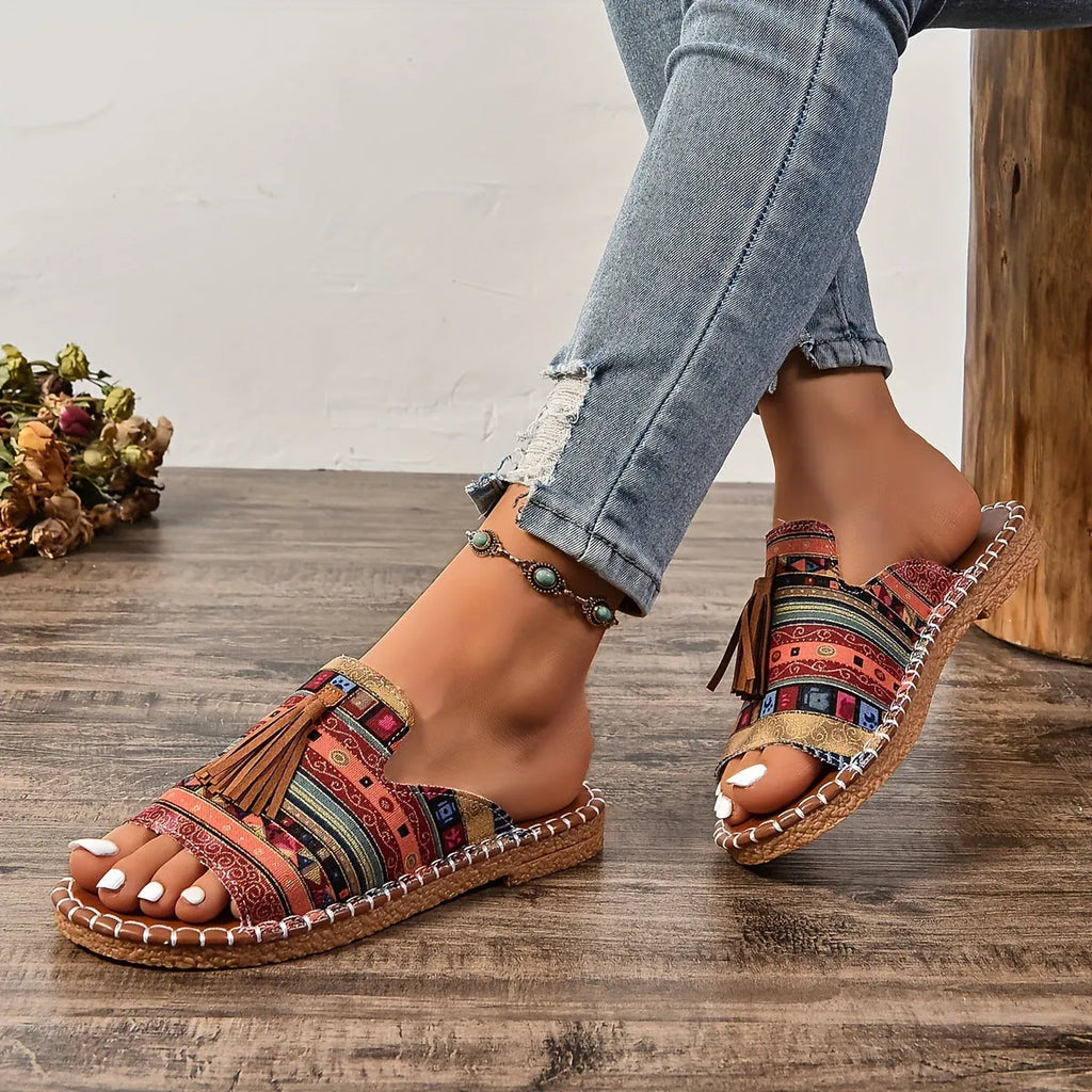 Women's tassel flat sandals in first layer cowhide with fish mouth toe, Roman style, shown in wine red