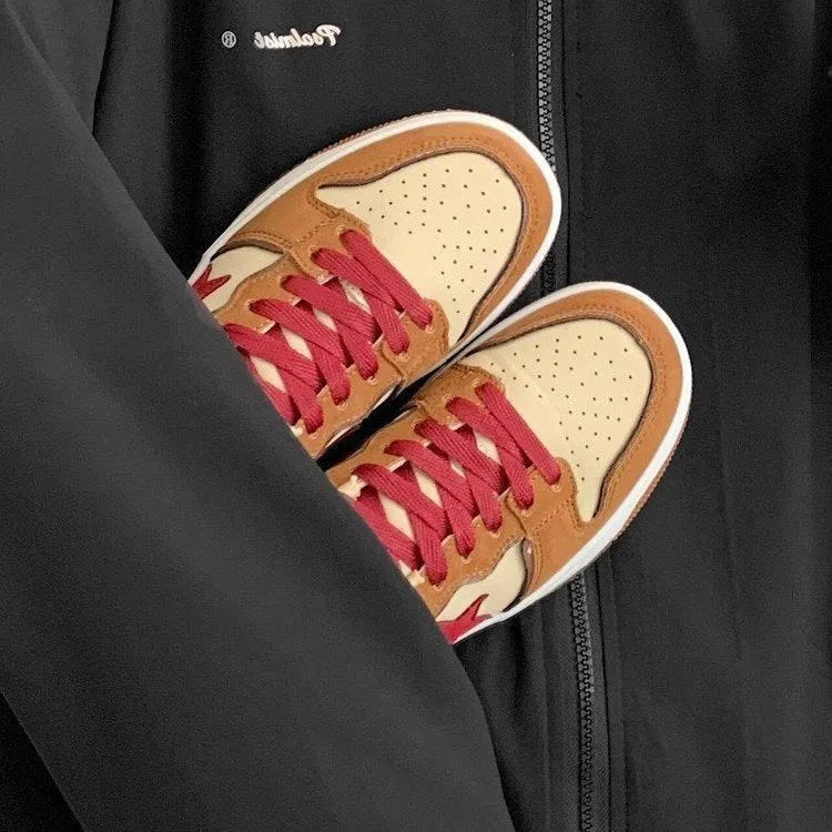 Brown low-top women's platform sneakers with sequin details and lace-up front.