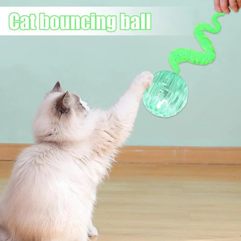 Bouncy TPR ball cat toy with soft plush tail attachment in green colour