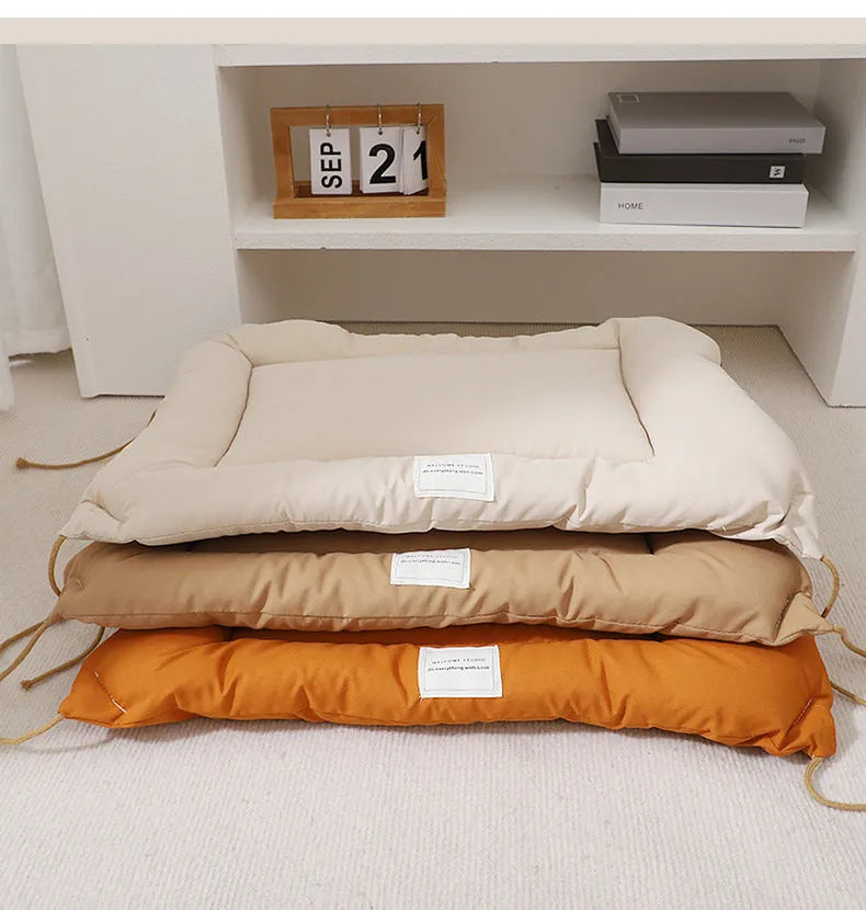 Tied cage cushion for dogs and cats in beige, coffee, or orange colours with four size options