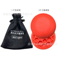 Orange natural rubber golf strength training mat for practising swing balance.