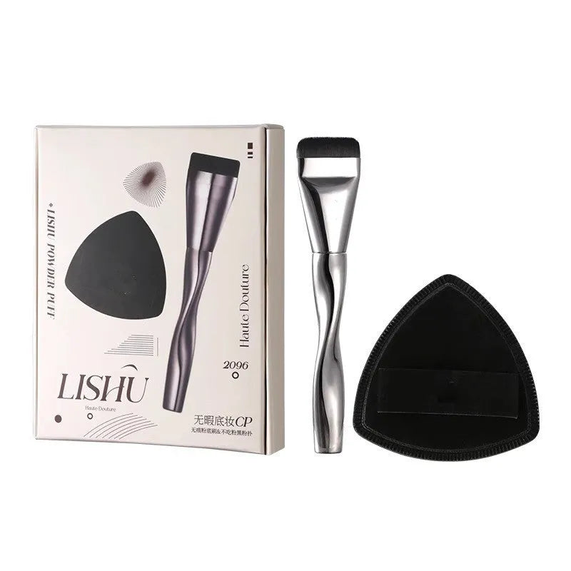 Spiral-shaped black powder foundation brush with long handle and separate makeup puff in packaging