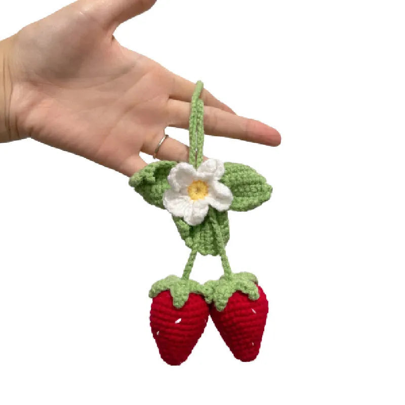 Handmade strawberry weaving car pendant with cotton hemp materials showing detailed stitching