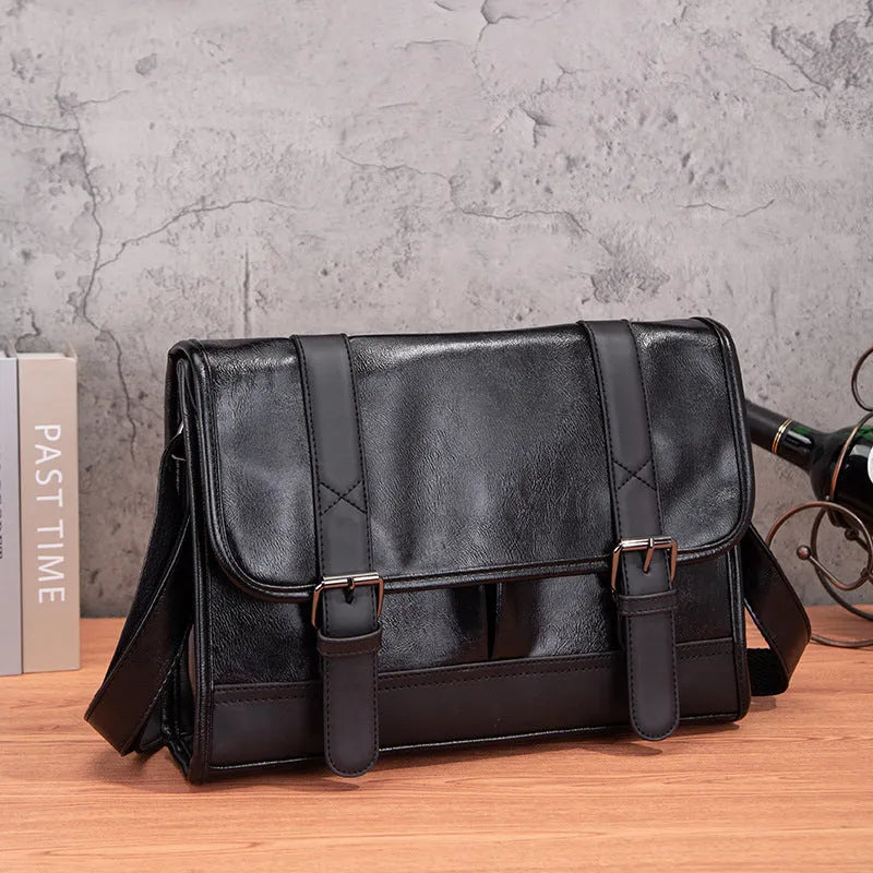 Black Korean-style men's anti-theft backpack made from PU material.