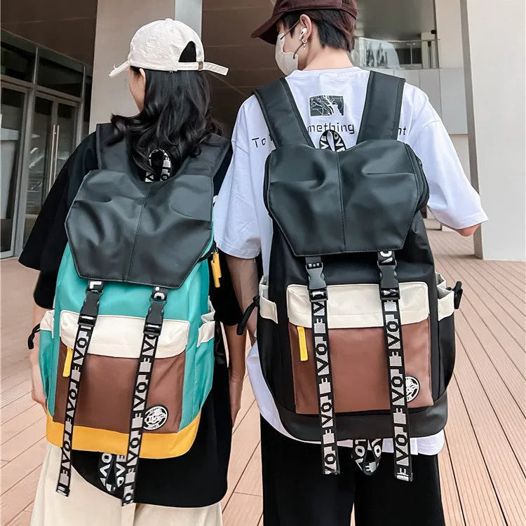 Oxford cloth backpack in black, green, or red with 32cm width and three carrying options
