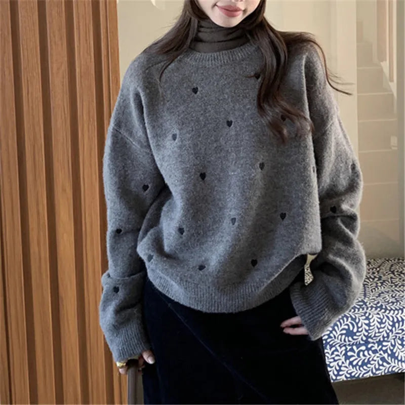 Women's acrylic pullover sweater with embroidery in milky white, loose fit for autumn and winter wear.
