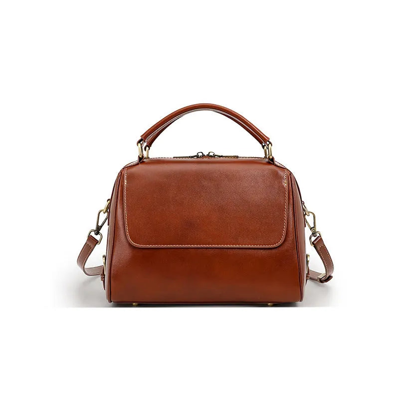 Women's soft genuine leather crossbody tote bag in apricot colour with slit pocket and double straps