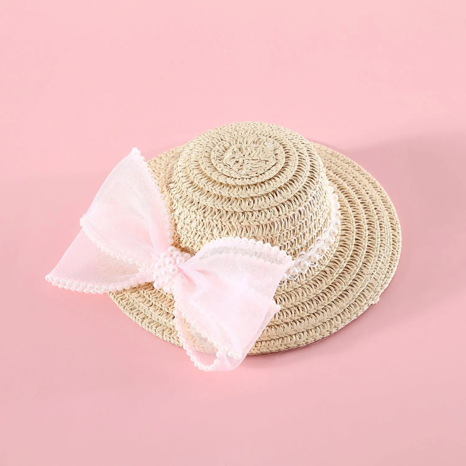 Pet cat wearing a straw hat with pearl bow in blue, sizes 13cm and 15cm, made from Lafite leaves.