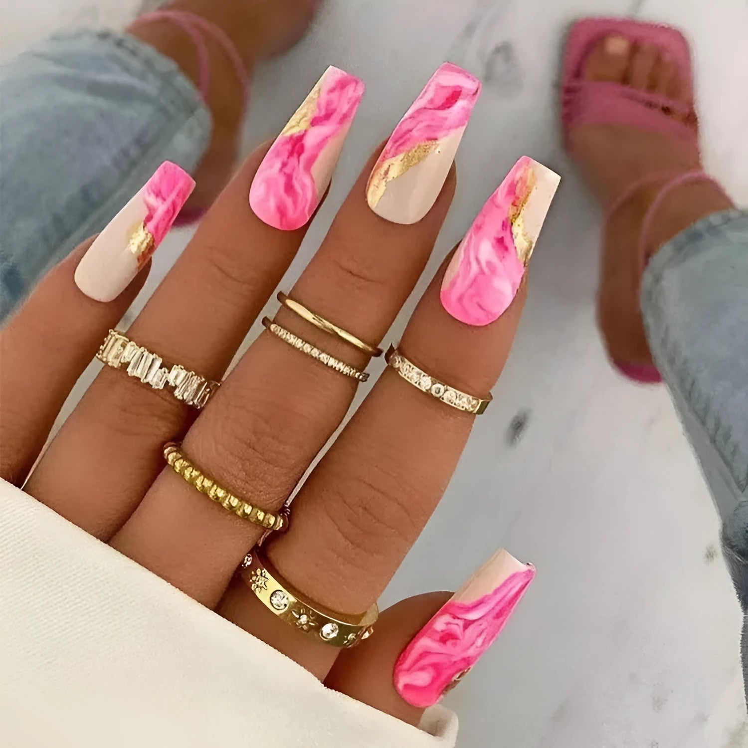 One Second Wearable Manicure press on nails showing rose, tulip, leopard and XINGX designs in blush colours