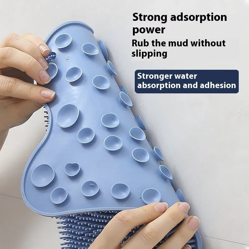 Blue silicone bath massage cushion measuring 31x32cm on white background