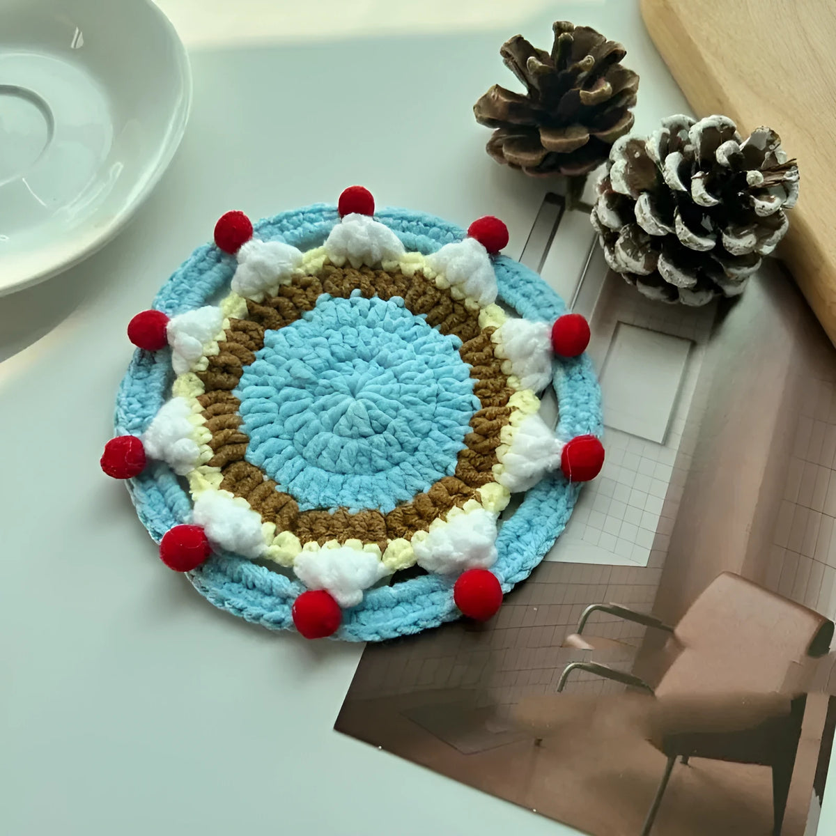 Knitted wool coaster bag with 9cm diameter for drink protection